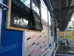 Enstall External wall insulation installation - CLT application